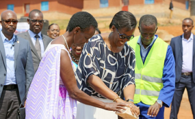 The First Lady and Chairperson of Unity Club, Mrs Jeannette Kagame, lays the foundation stone of a future hostel in Huye with AVEGA-Agahozo president Valerie Mukabayire (L). The First Lady said Rwandans can only achieve sustainable development if all stakeholders, including government, individuals and development partners, invest in programmes that bring about social cohesion. 