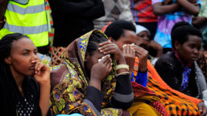 Mourners listen to a genocide survivor giving testimony during a commemoration event at Murambi Genocide Memorial in 2017. The uncertainty surrounding the Covid-19 outbreak has heightened mental health problems among the survivor community (photo: Sam Ngendahimana, The New Times)